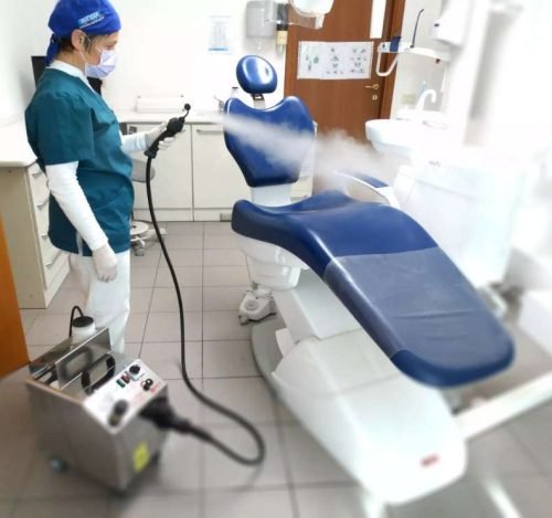 Pure Commercial Steam Cleaner cleaning a dentists chair in a dentist surgery, Steam Cleaner