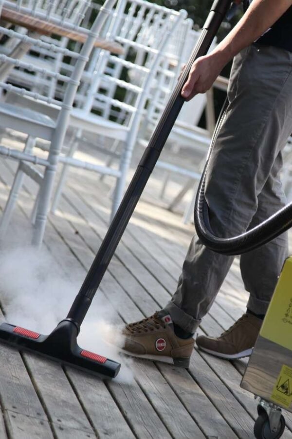 the powerful Pure i6 industrial steam cleaner being used to clean wooden floor and deckings