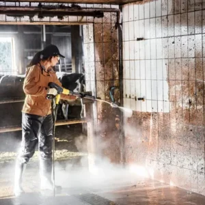 Pure Commercial & Industrial Steam Cleaners UK 6 cleaning the walls and floor of a dairy industry and animal agriculture farm with Commercial steam cleaner . Buy the best steam cleaning machine to remove the dirt and dust and provide healthy animals and customers